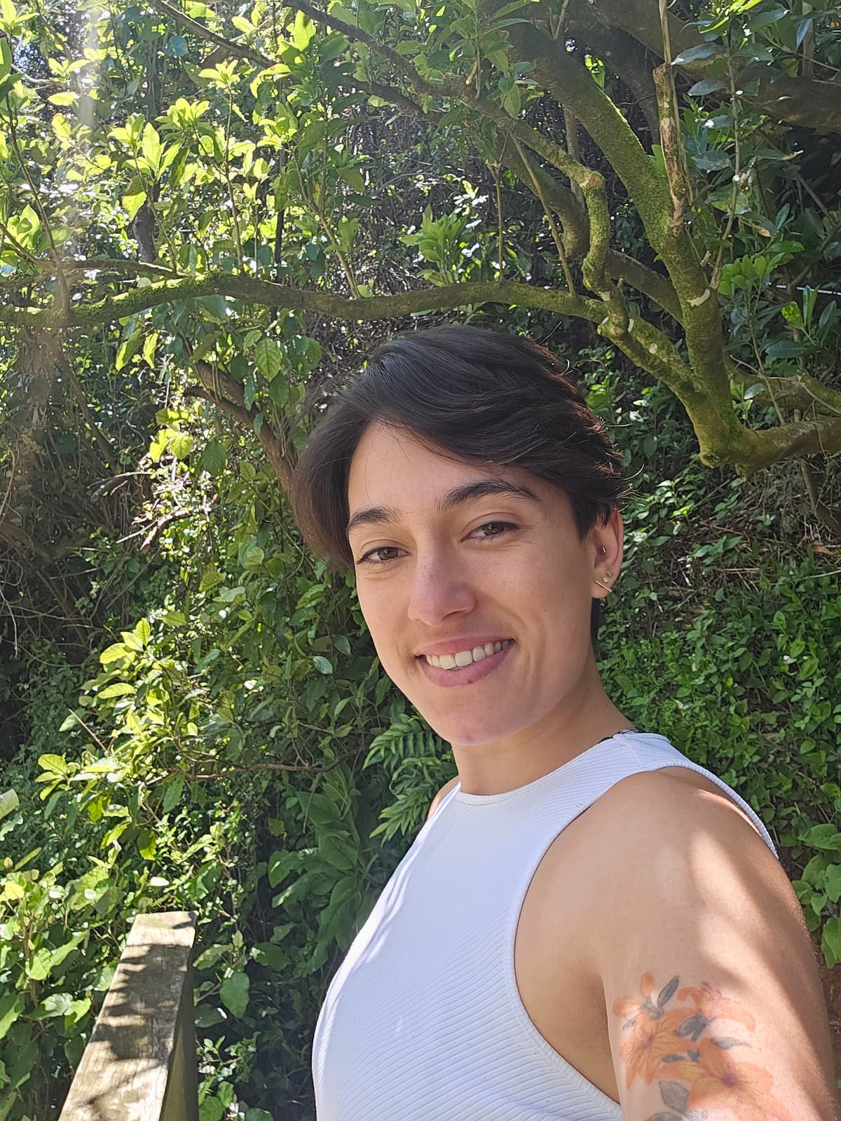 Photo of personal trainer Grace David in a New Zealand nature setting